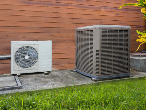 Air conditioner and heat pump outside an AZ home